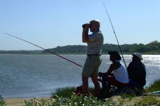 Saint Lucia - Met vissers aan het binnenmeer, hier ook krokodillen en verderop Nijlpaarden