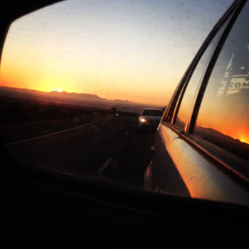 West-Kaap - The sunset in a rental car